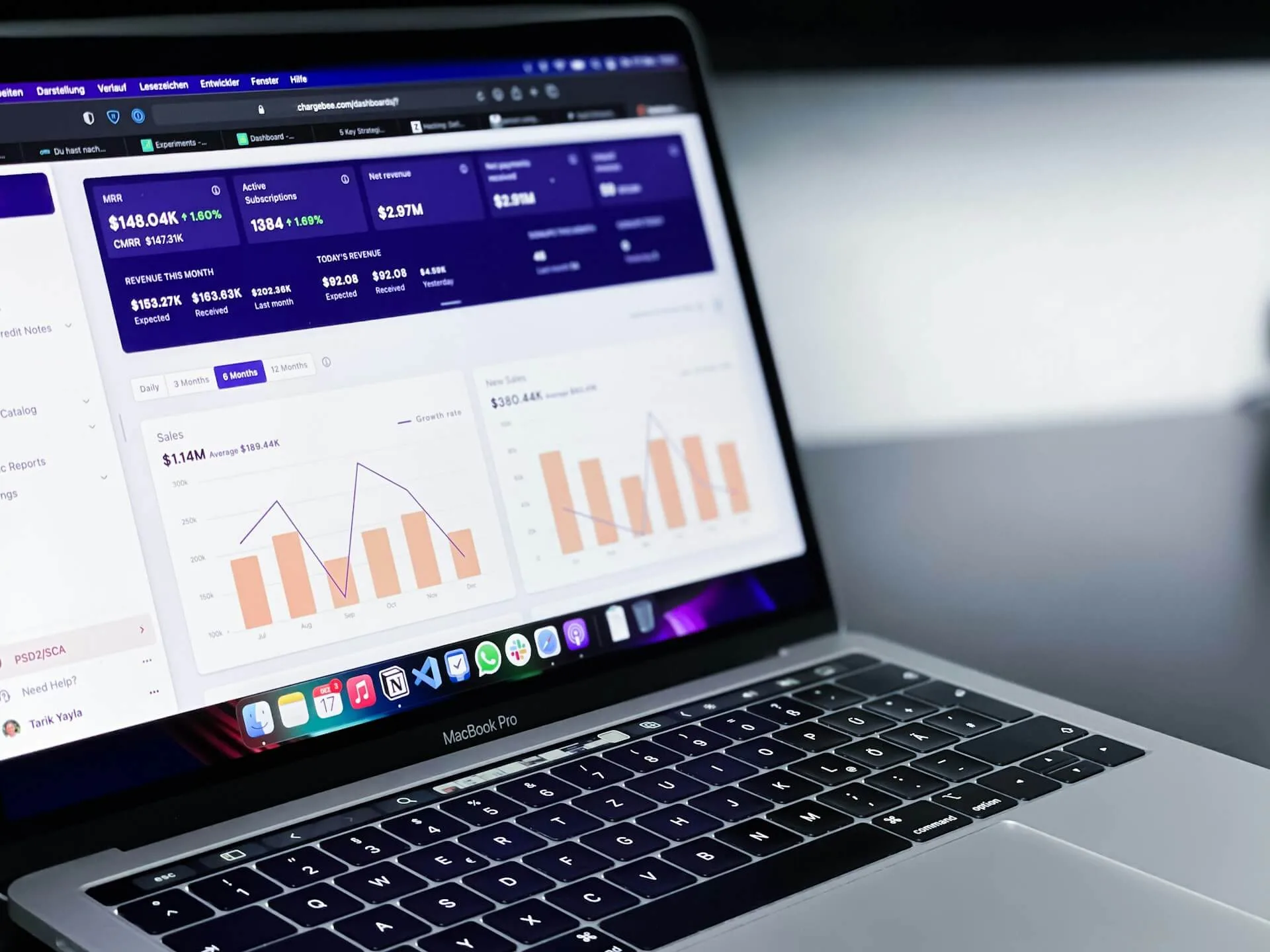 MacBook Pro displaying revenue and subscription growth dashboard, representing transparent monthly SEO reporting and measurable business results
