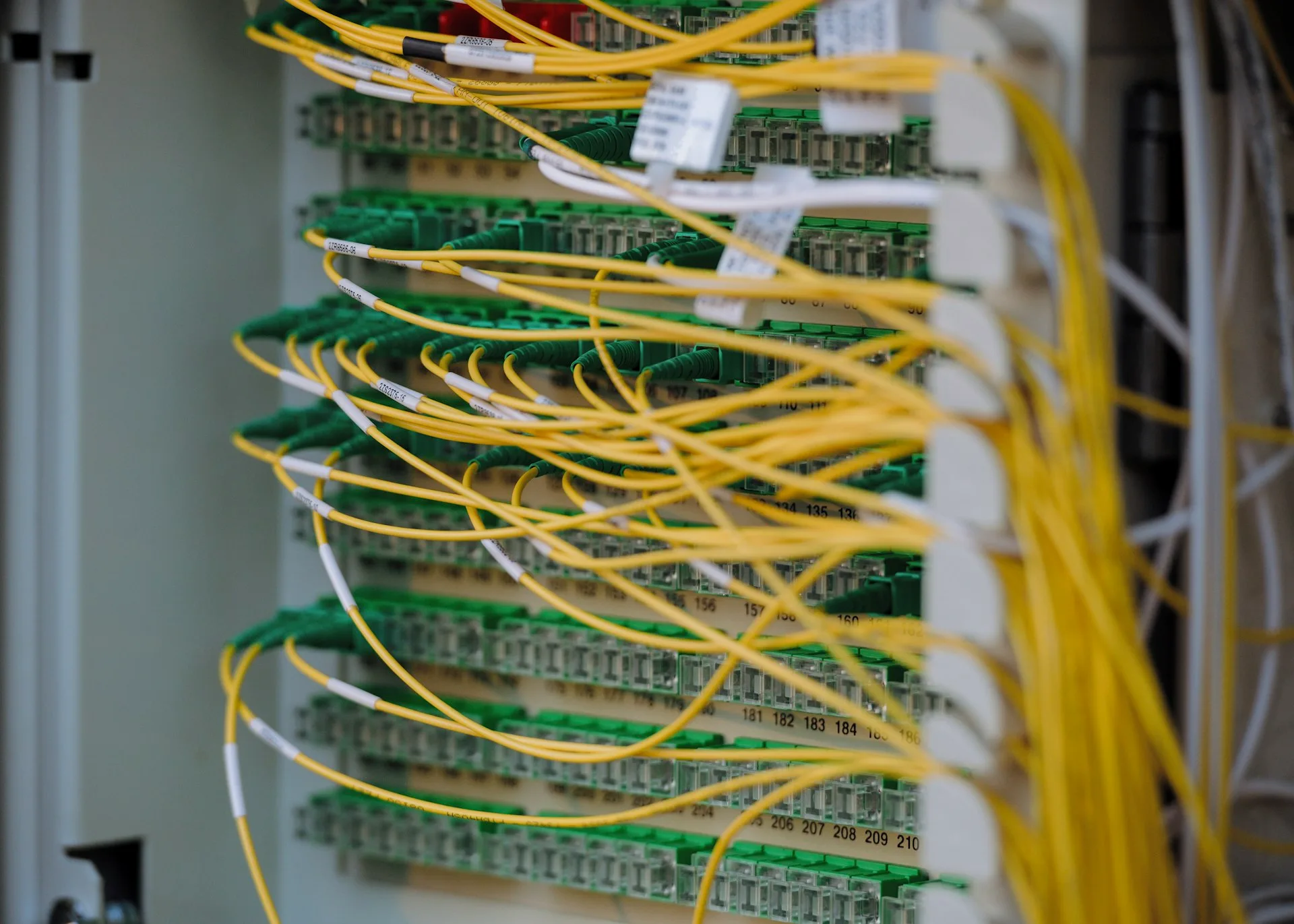 Server infrastructure and fiber optic cables representing the technical foundation of a well-optimized website